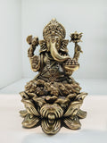 Mini brass Padmasana Ganapati statue sitting on a lotus base, front view