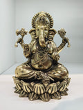 Medium brass statue of Ganesh in padmasana posture with lotus base