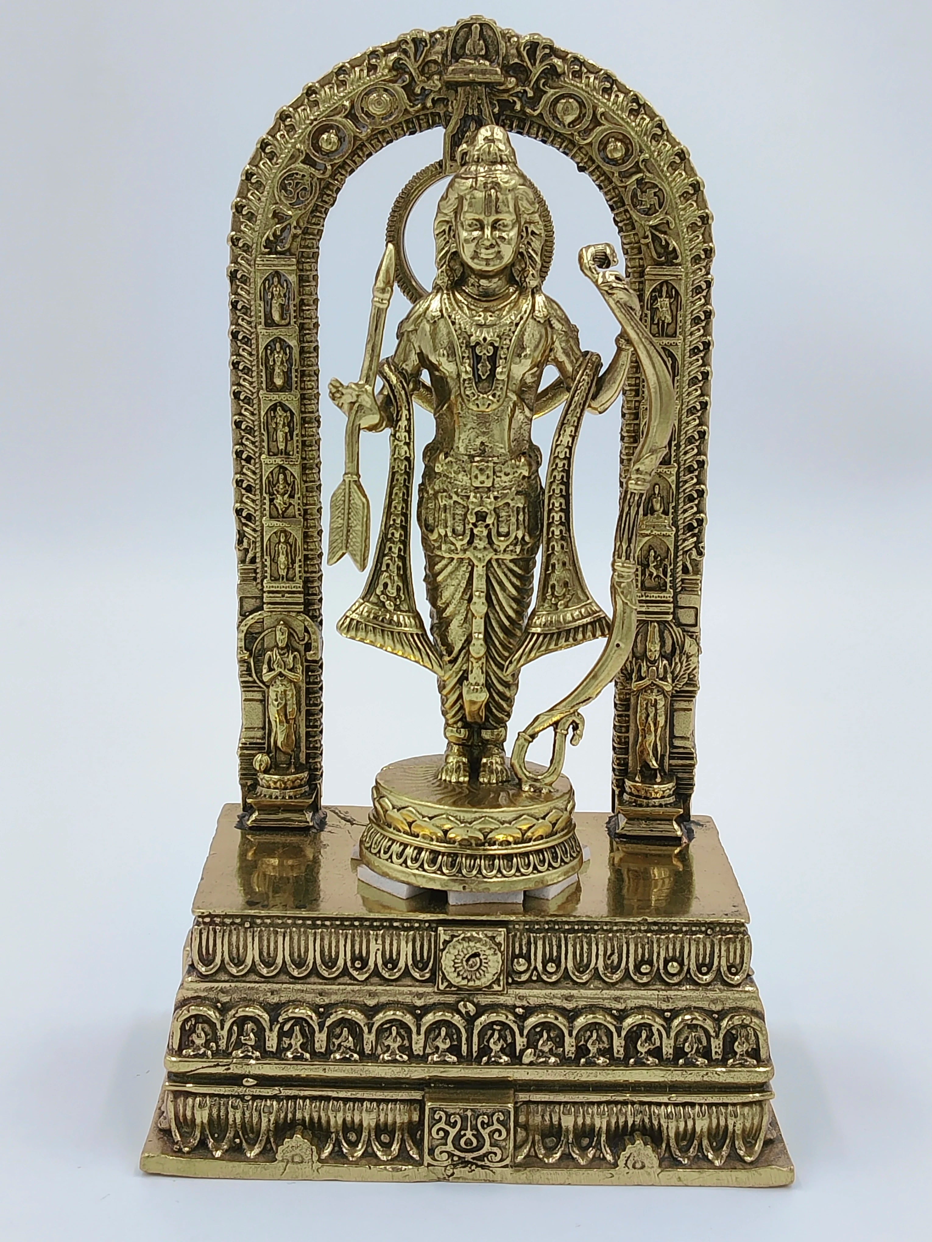 Brass sculpture of Ayodhya Rama standing on ornate pedestal with arch backdrop