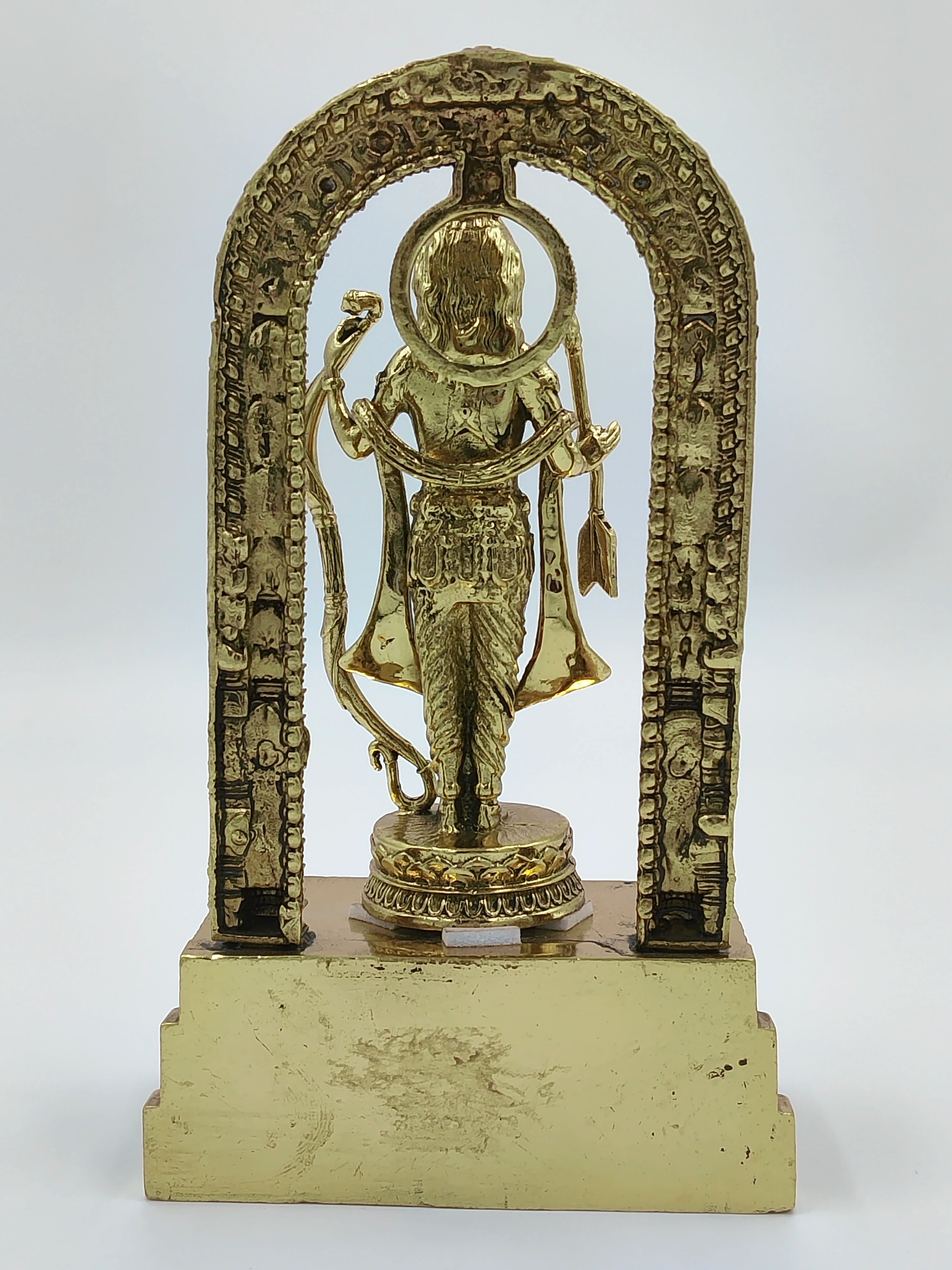 Back view of brass Ayodhya Rama sculpture with ornate arch and bow