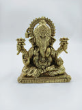 Small brass Padma Hasta Ganapati statue seated with detailed ornaments