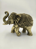 Handcrafted small brass elephant sculpture with detailed ornamental patterns