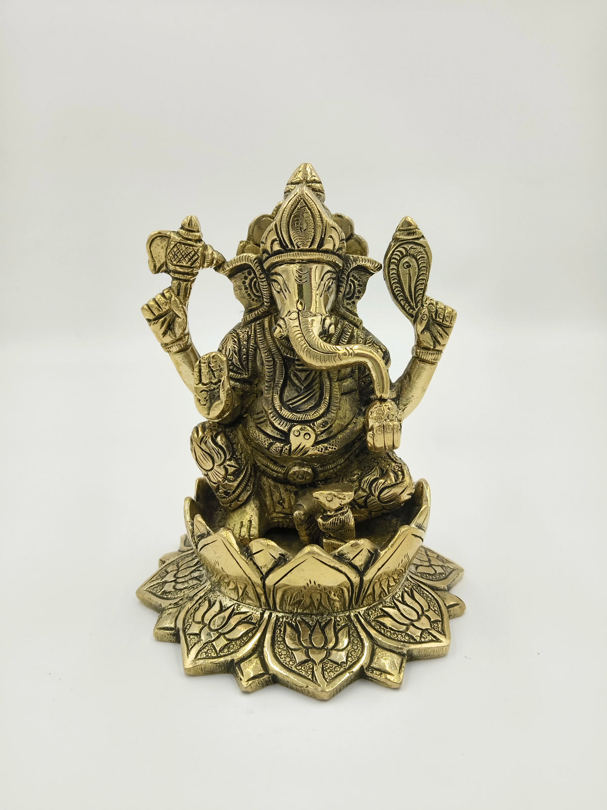 Brass Padma Hasta Ganapati sculpture sitting on a lotus base, front view