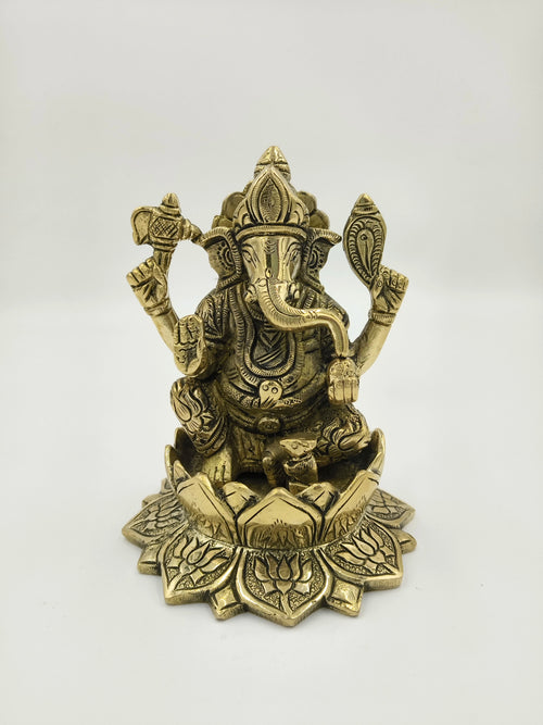 Brass Padma Hasta Ganapati sculpture sitting on a lotus base, front view