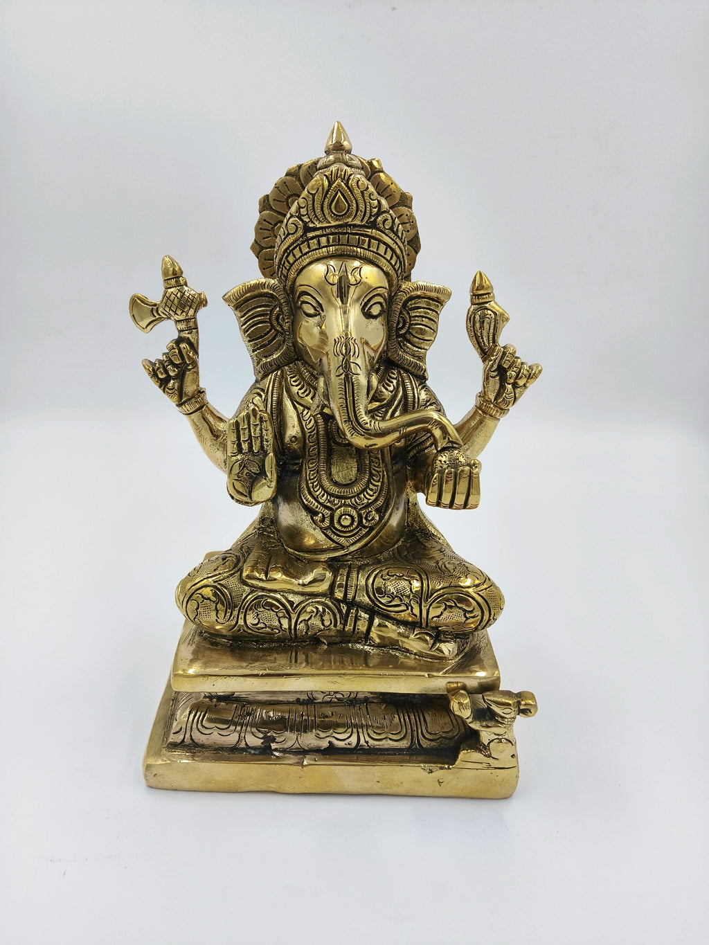 Large brass Padmasana Ganapati statue with detailed carvings and seated posture