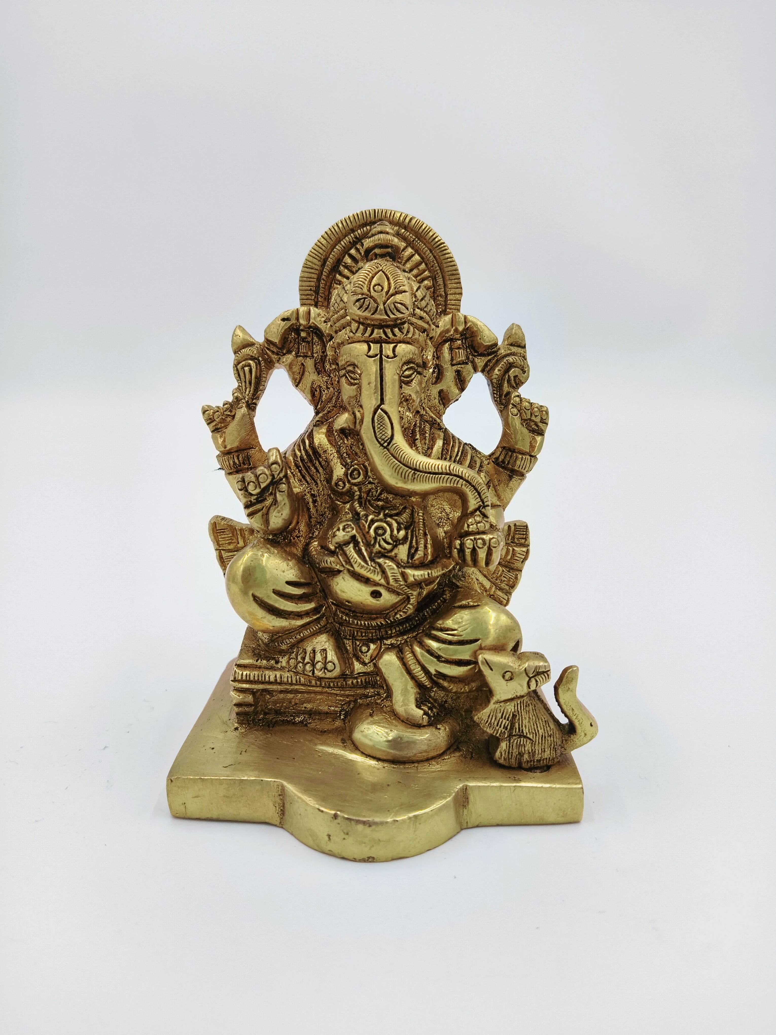 Small brass Siddhi Vinayaka statue with seated Ganesh and mouse on base