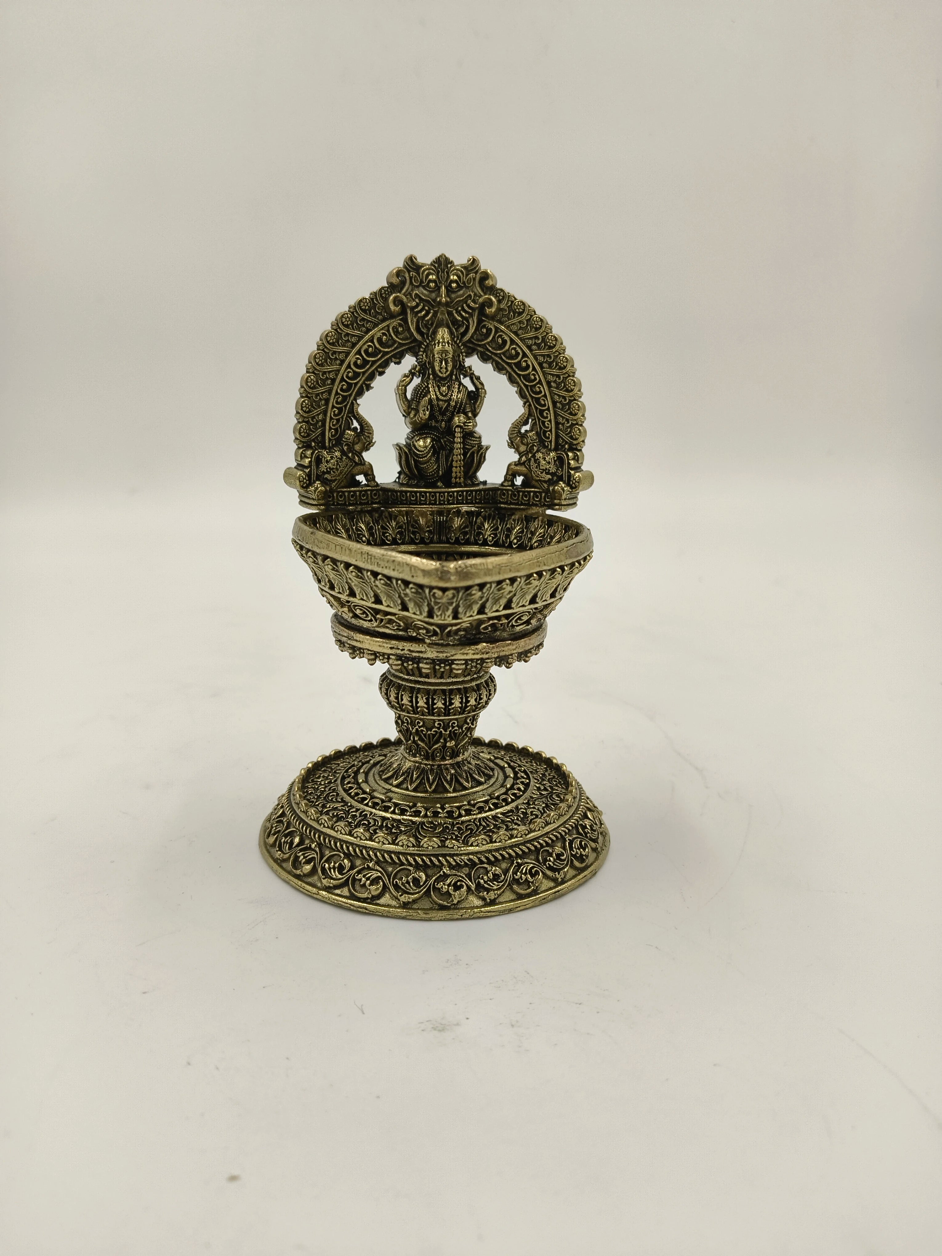 Medium brass sculpture of Arch Lakshmi Deep with intricate detailing