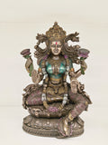 Large polyresin statue of Goddess Lakshmi seated on lotus with four arms