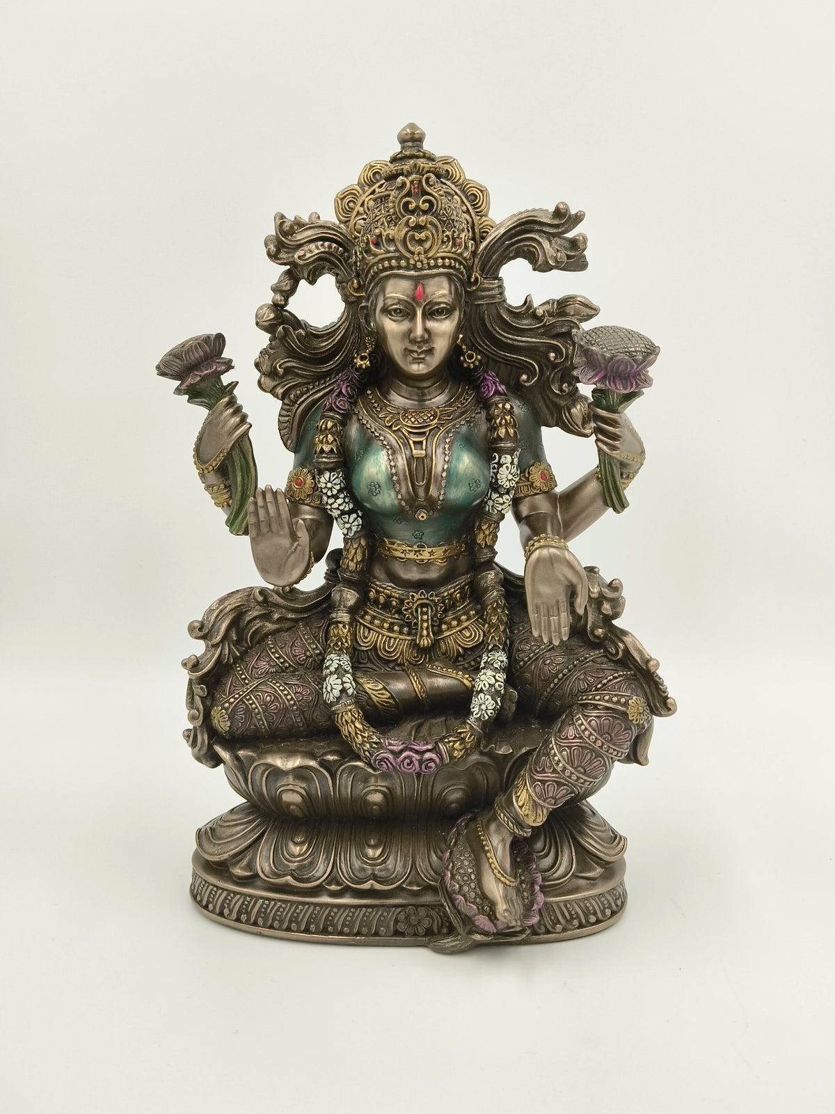 Large polyresin statue of Goddess Lakshmi seated on lotus with four arms