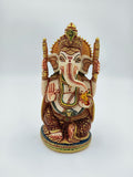Medium polyresin statue of deity Ganesh in traditional attire, front view