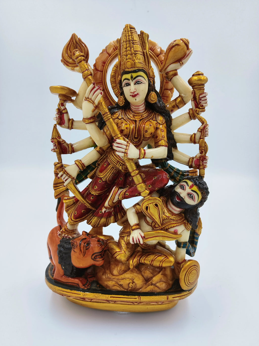 Polyresin sculpture of Durga goddess with multiple arms and lion, large detailed artwork