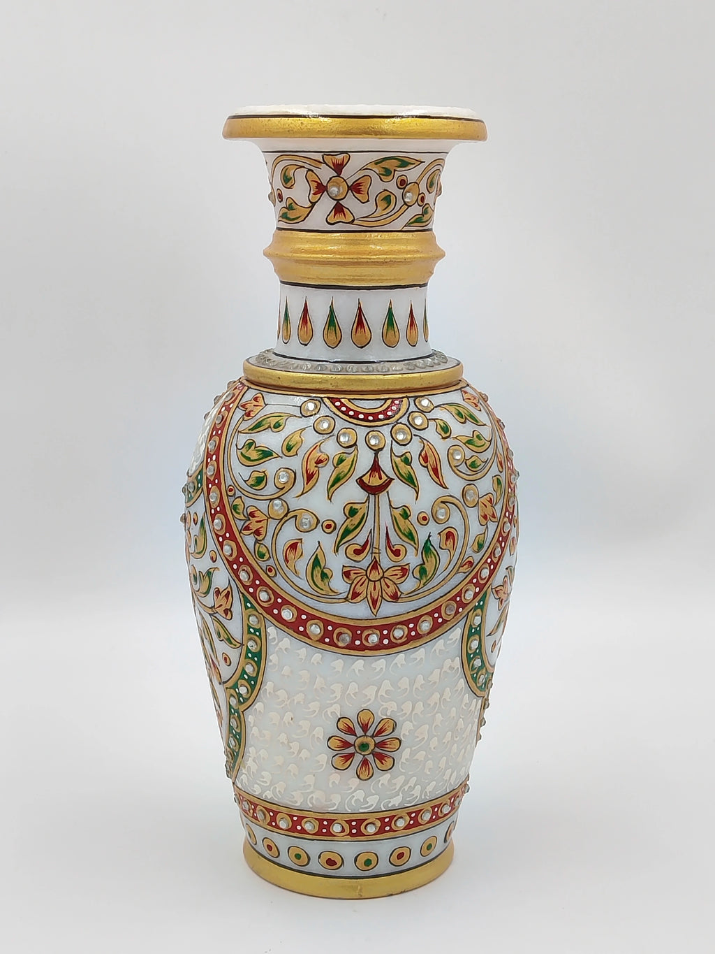 Large white marble flower vase with intricate red, green, and gold floral designs