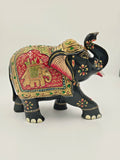 Handpainted wooden elephant sculpture with embossed colorful floral and decorative patterns