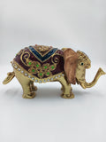 Copper elephant figurine with colorful enamel and decorative stones side view
