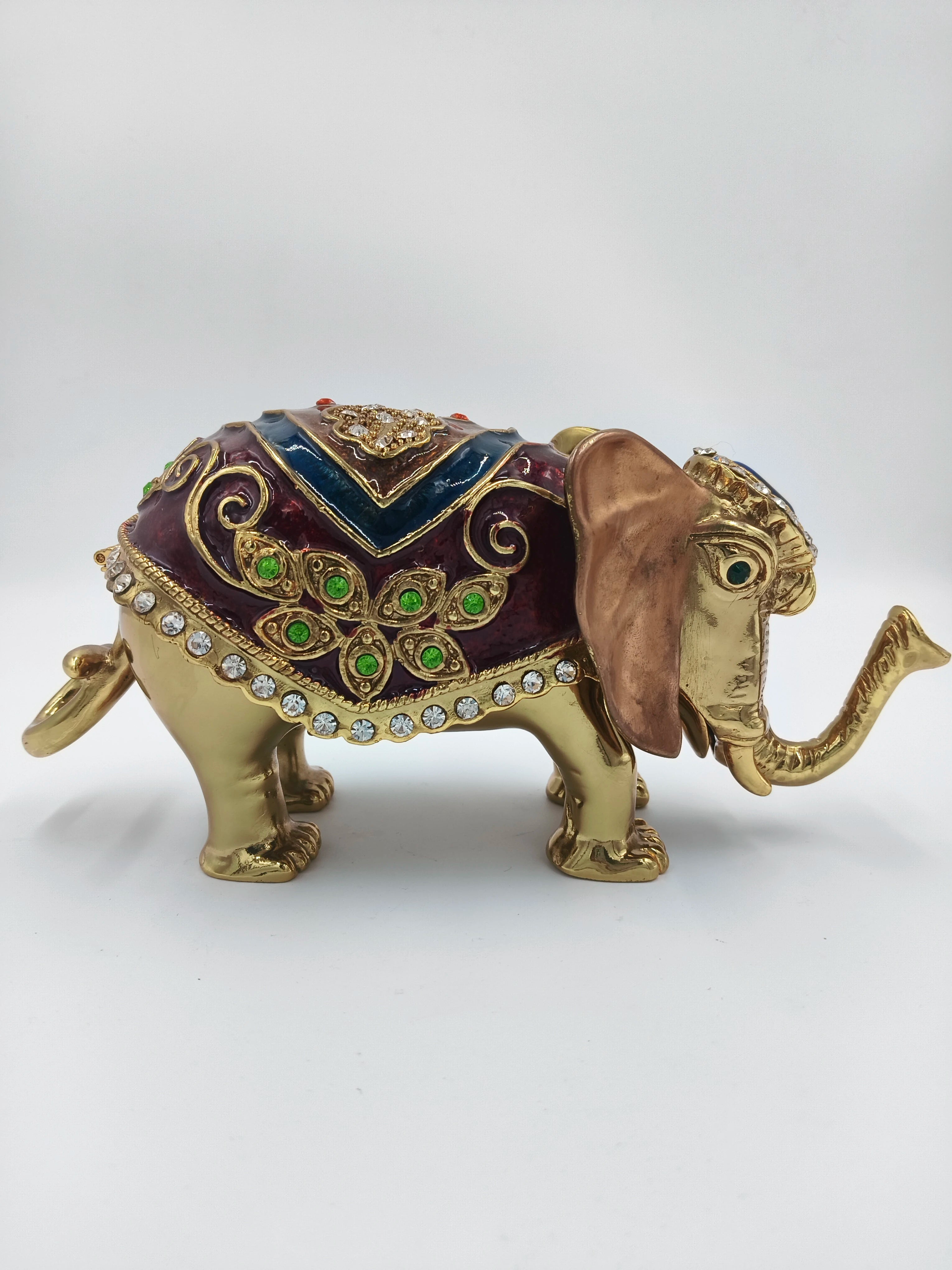 Copper elephant figurine with colorful enamel and decorative stones side view