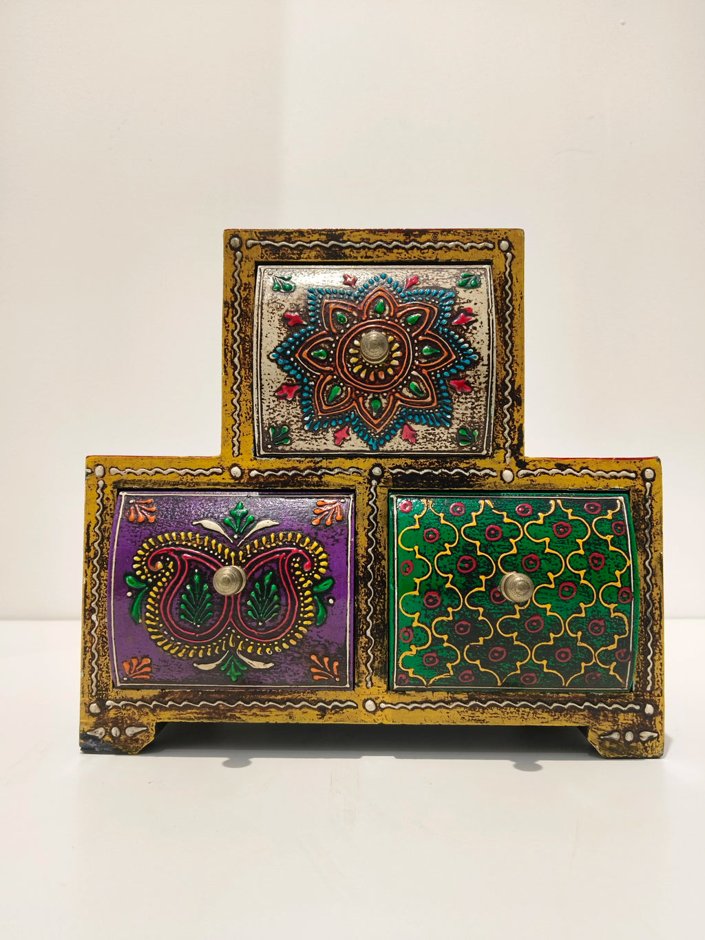 Large wooden spice box with three drawers decorated with colorful floral patterns