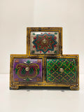 Large wooden spice box with three drawers decorated with colorful floral patterns