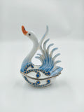 Small brass enamel swan sculpture with blue artificial stones and orange beak