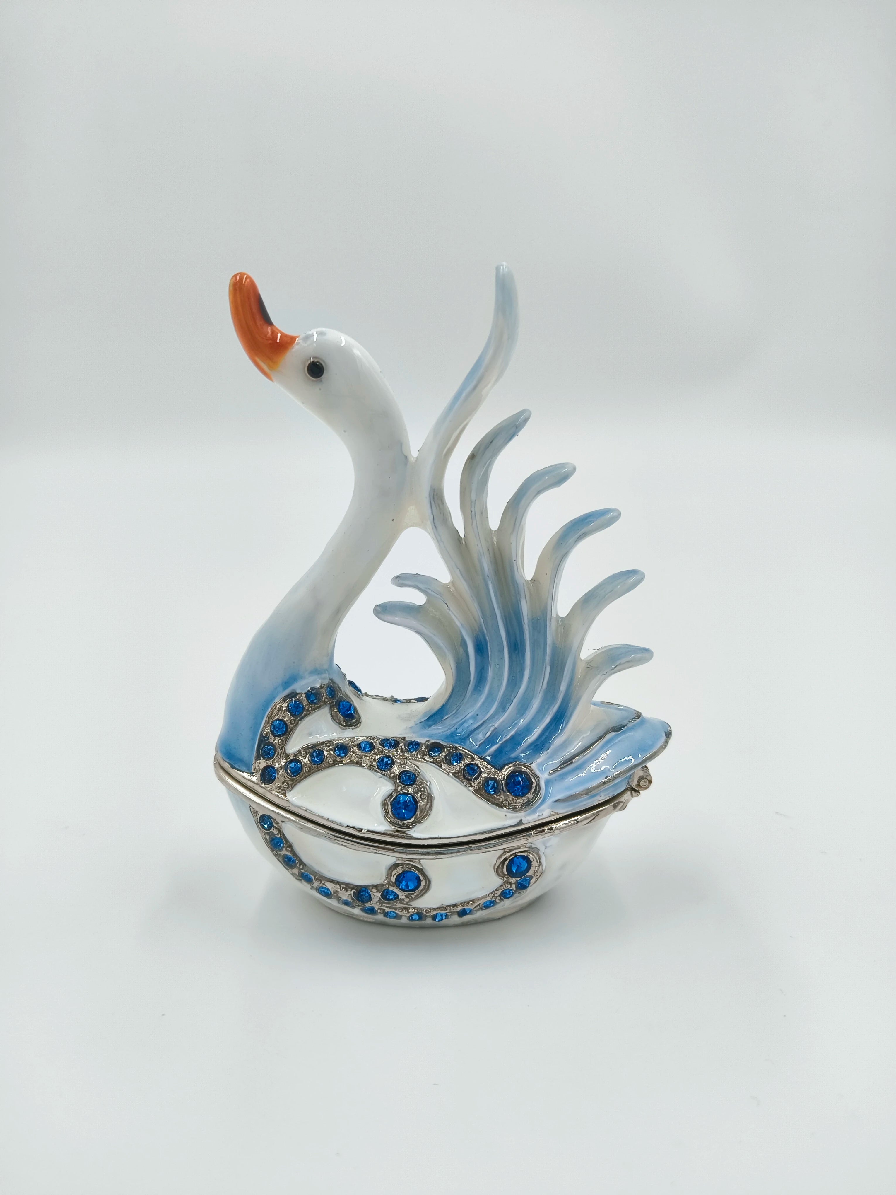Small brass enamel swan sculpture with blue artificial stones and orange beak