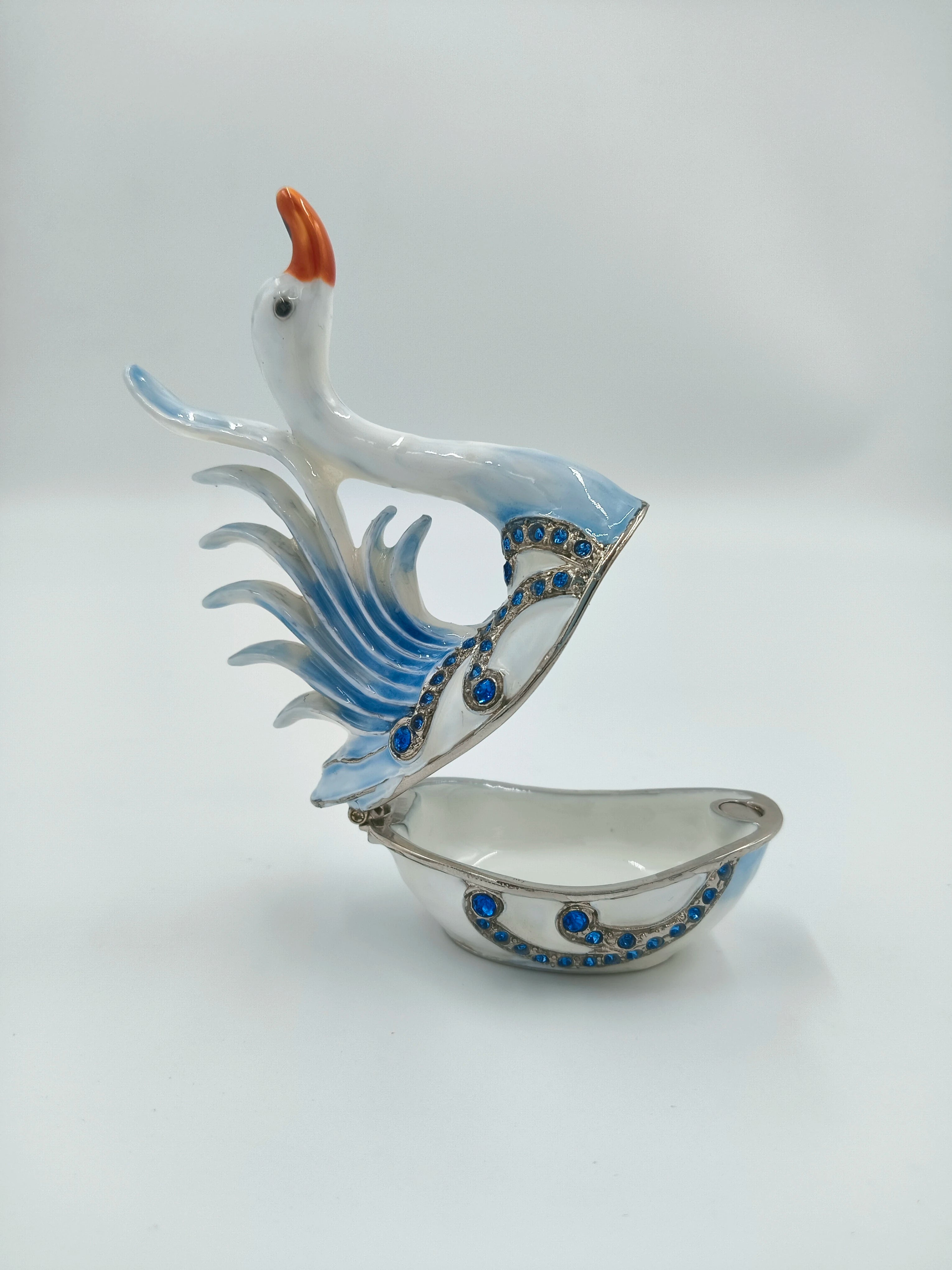 Small brass enamel swan sculpture with blue artificial stones and hinged opening