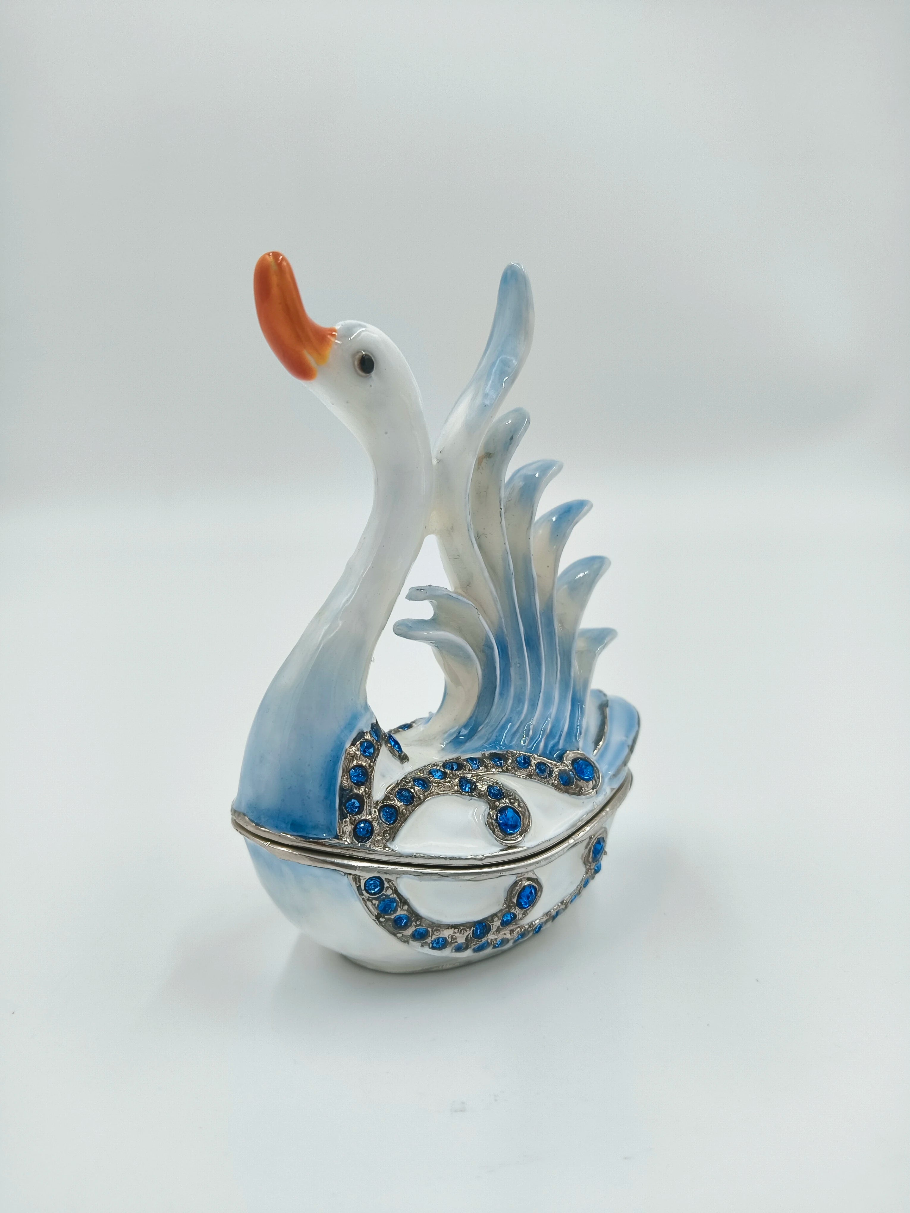 Brass enamel swan figurine with blue artificial stones, side view