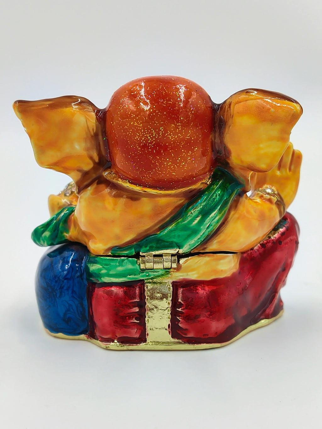 Back view of brass enamel Ganesh statue adorned with artificial stones