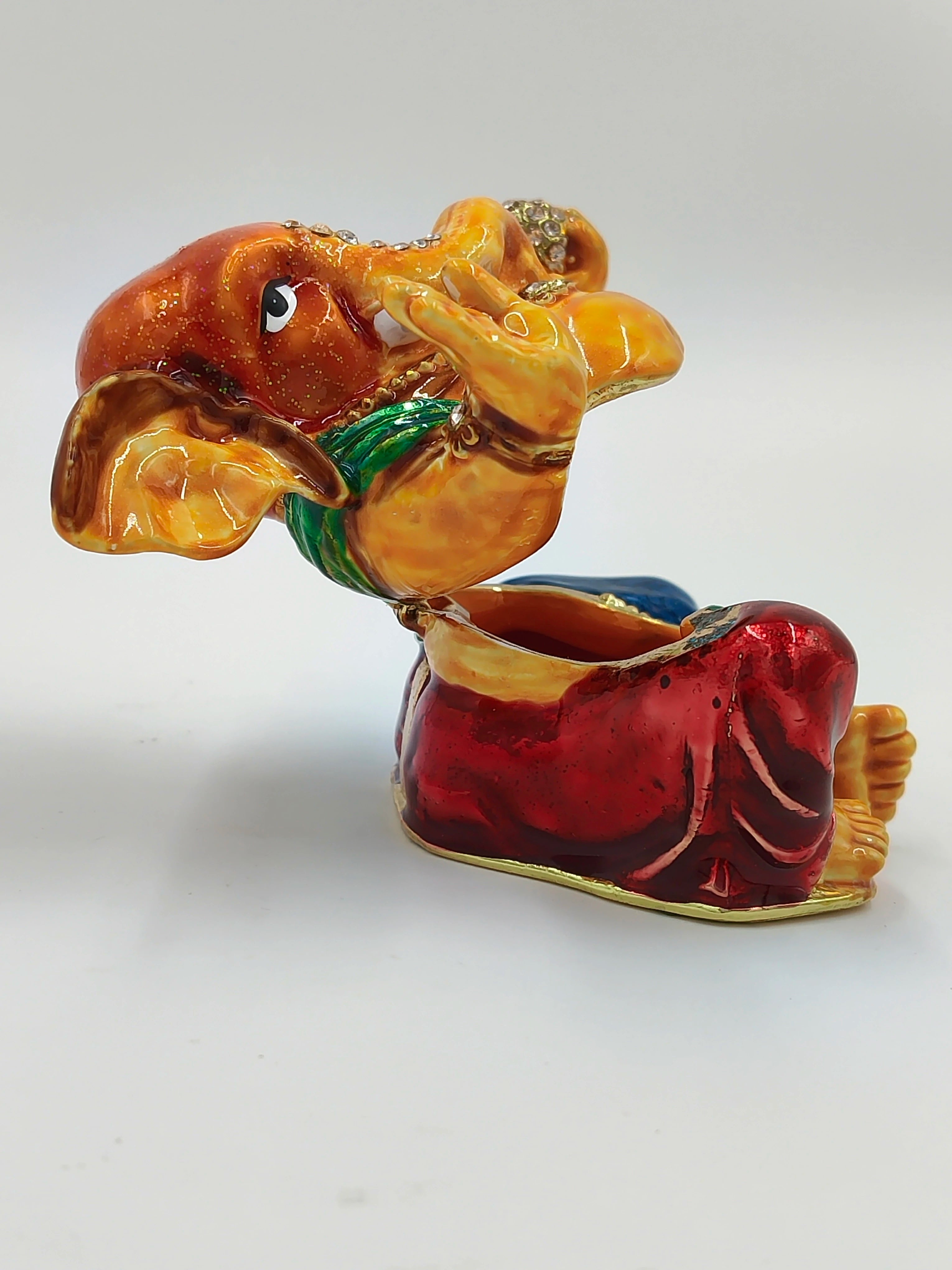 Side view of brass enamel Ganesh sculpture with artificial stones and vibrant colors