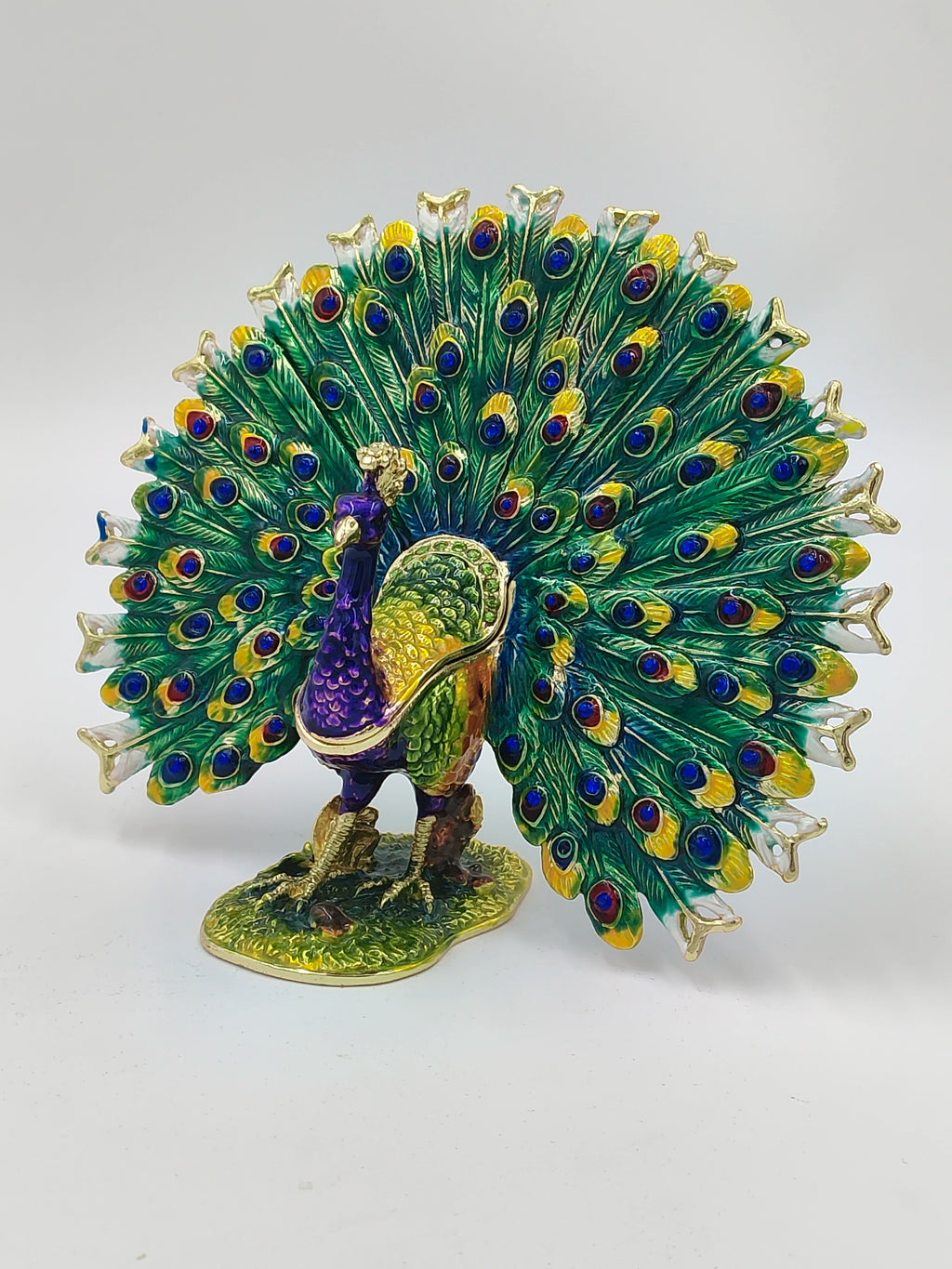 Brass enamel peacock figurine with colorful artificial stones, front view