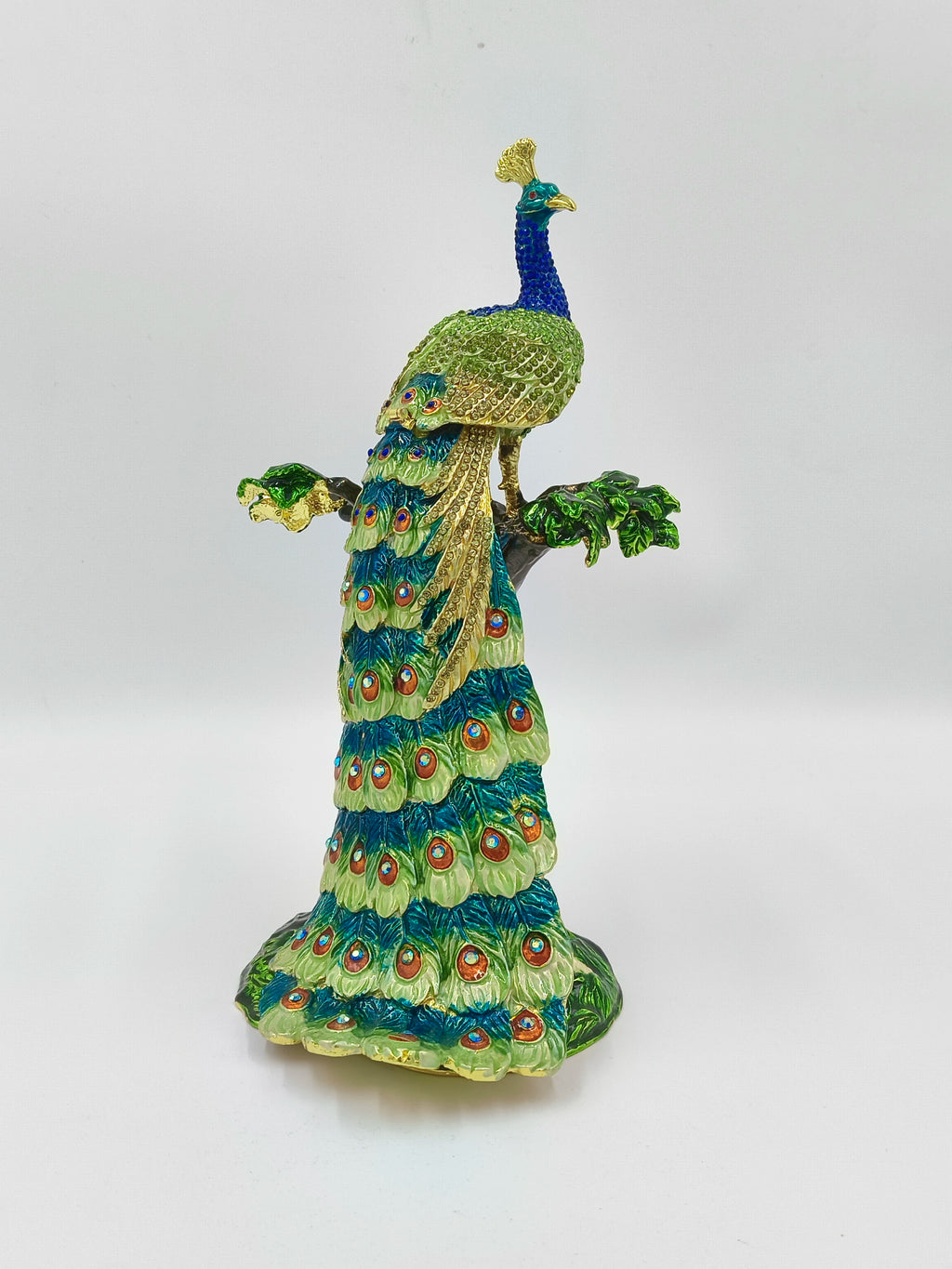 Large brass and enamel peacock sculpture with artificial stones on tree branch