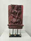 Large wooden Mahishasura Mardini sculpture with three hanging brass bells on black stand