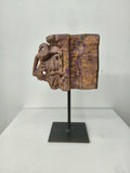 Large rustic wood candle stand with carved details on metal base