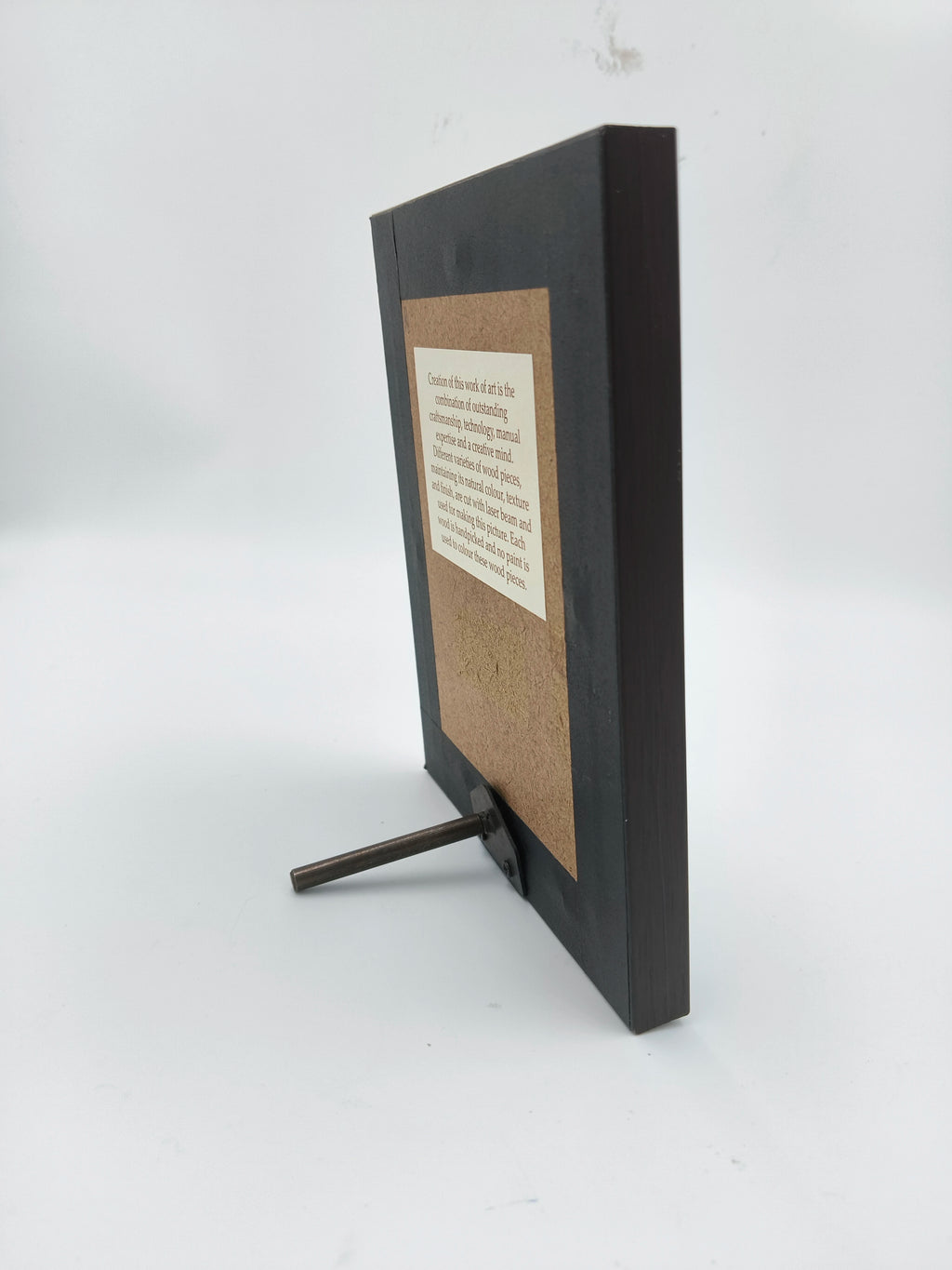 Side view of mini wooden framed art picture with support stand