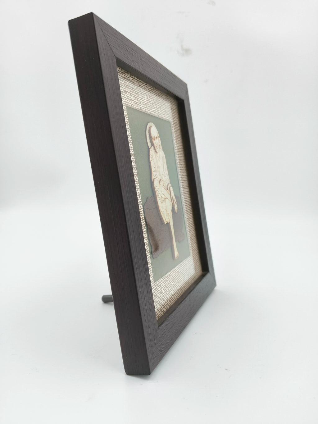 Side view of mini wood art picture frame featuring Shirdi Sai Baba