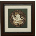 Square wooden wall art with framed carved image of Hindu deity Ganesh