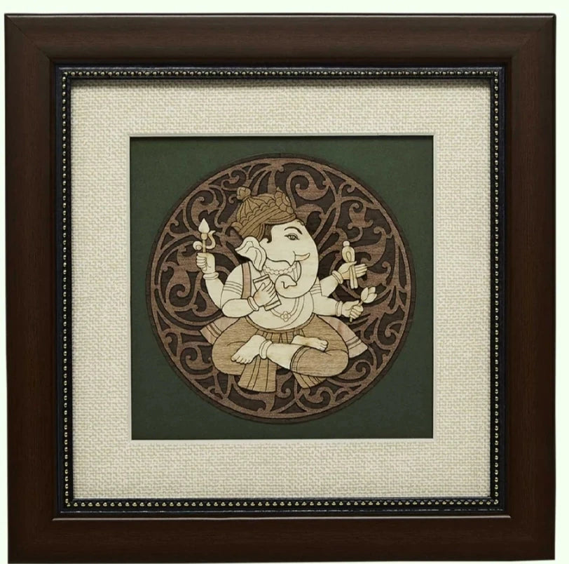 Square wooden wall art with framed carved image of Hindu deity Ganesh