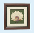 Framed wooden peacock art picture with beige and green background