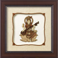 framed wooden art picture of Hindu goddess Saraswathi playing veena on lotus