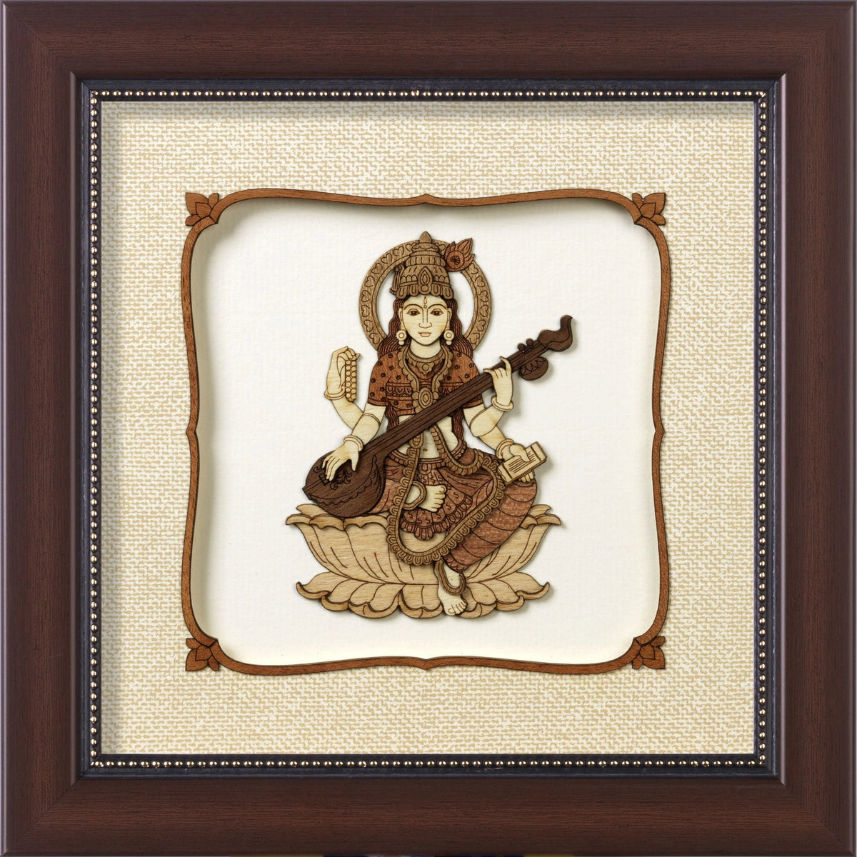 framed wooden art picture of Hindu goddess Saraswathi playing veena on lotus