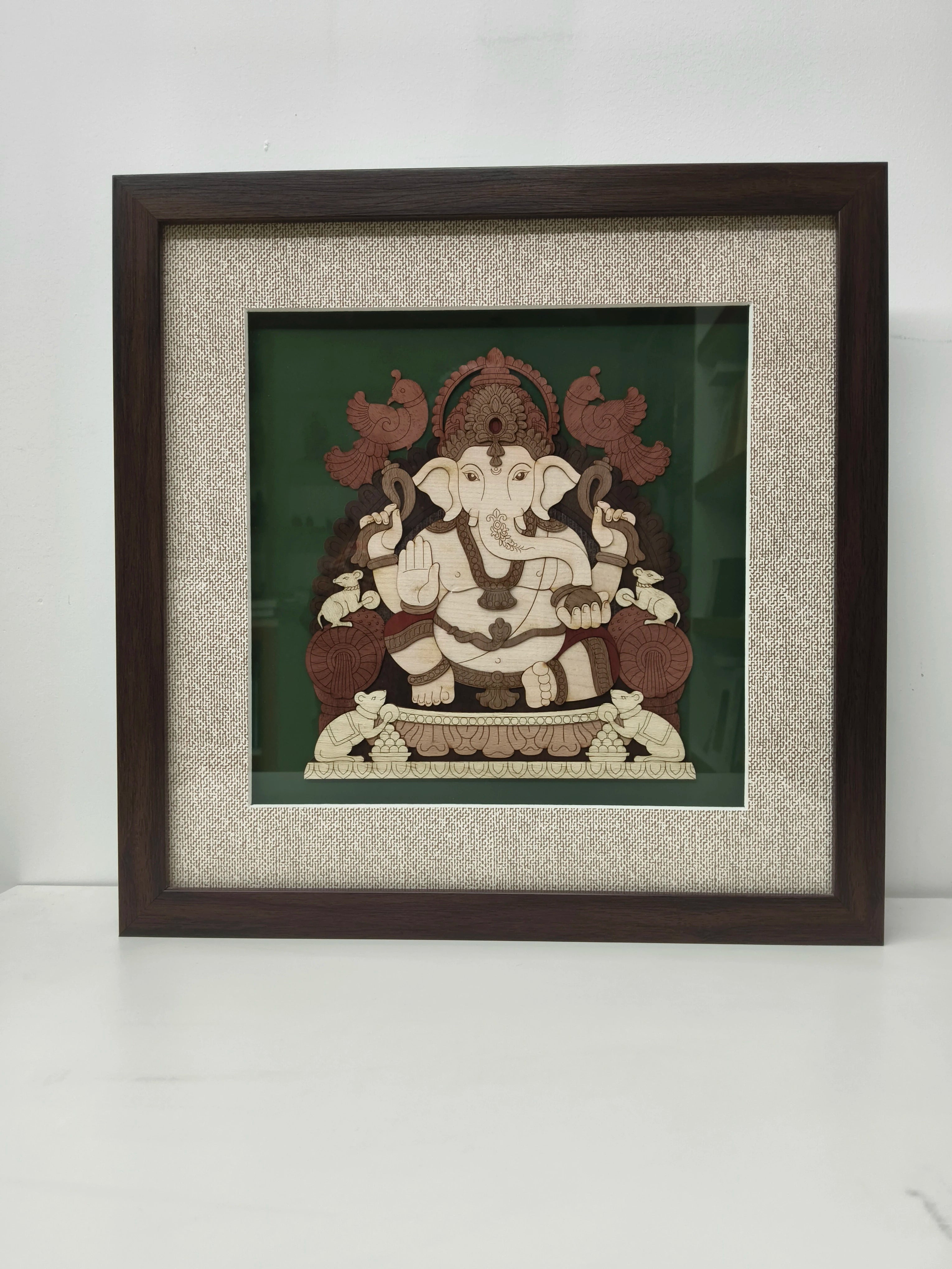 Medium wooden wall art of Lord Ganapathi in a dark brown frame with textured beige mat