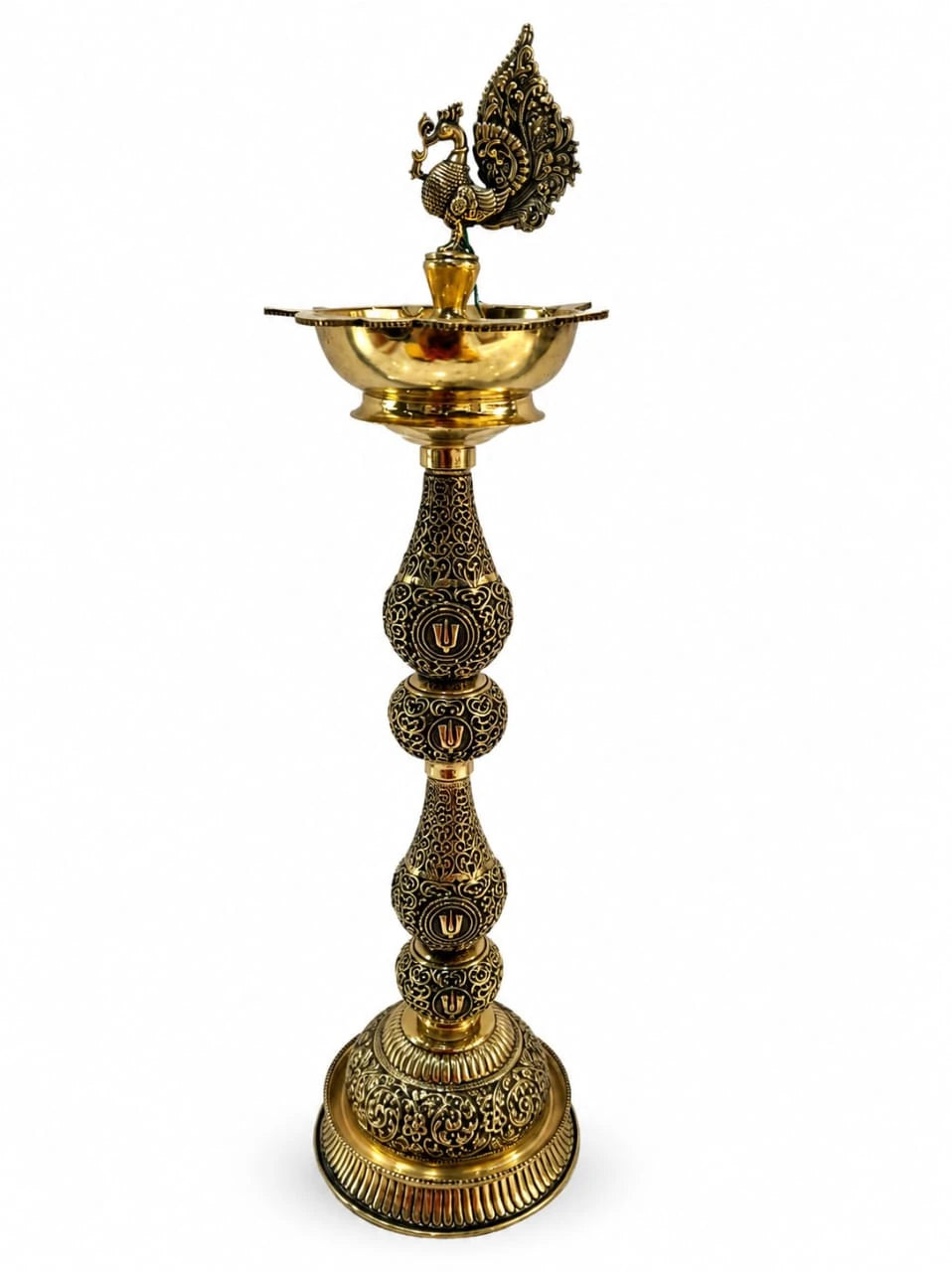 Brass royal peacock lamp with intricate tail design and wide bowl