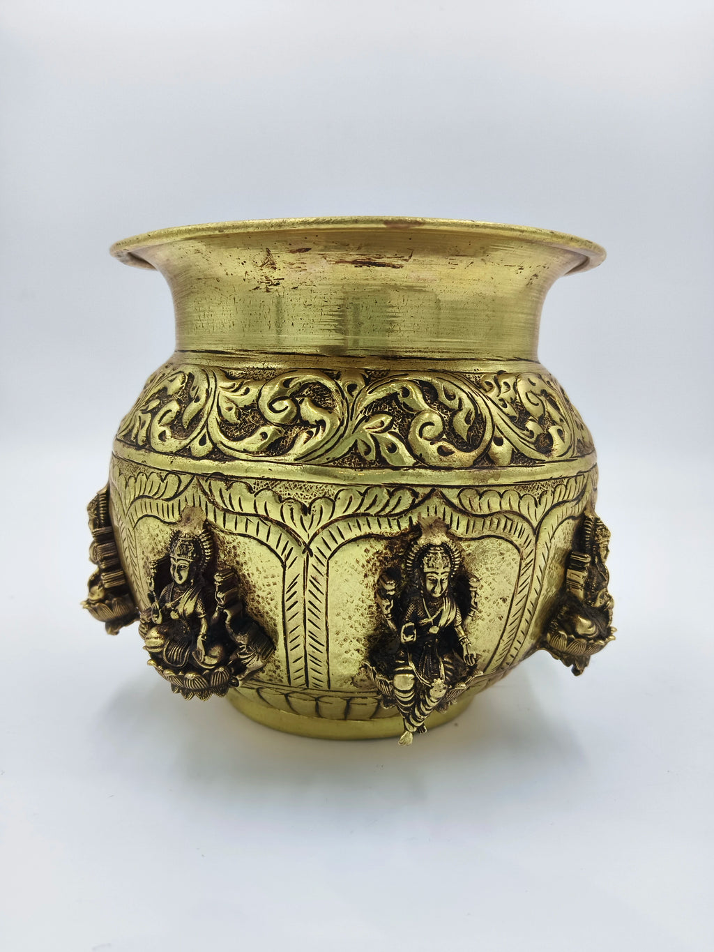 Medium brass Ashtalakshmi Kalash with intricate deity and floral designs