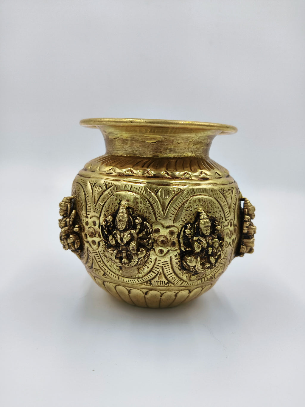 Small brass Ashtalakshmi kalash with detailed deity engravings