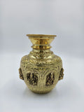 Medium brass Ashtalakshmi kalash with embossed deity figures and decorative patterns