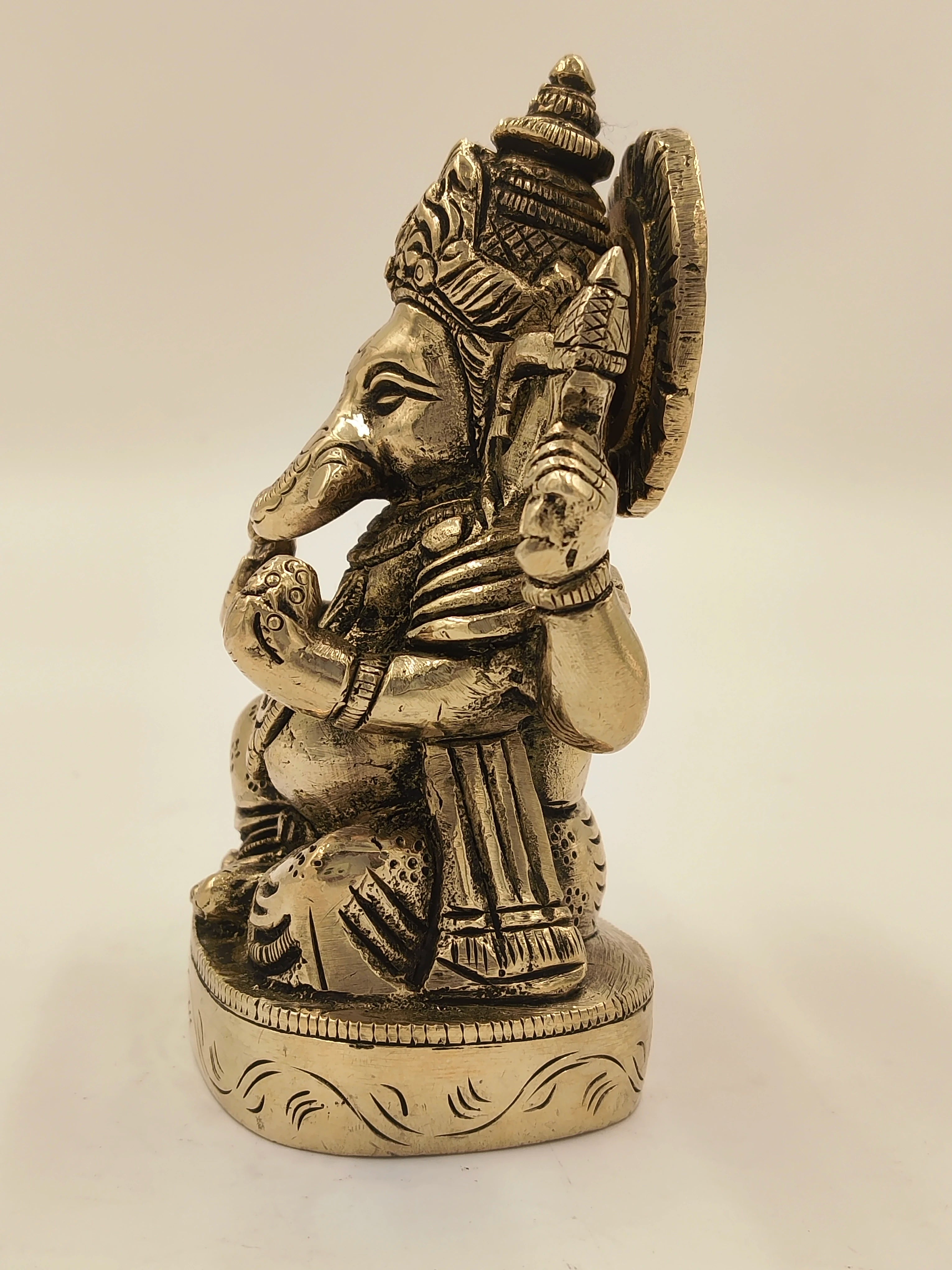 Brass medium-sized Ananda Ganapathi sculpture, side view