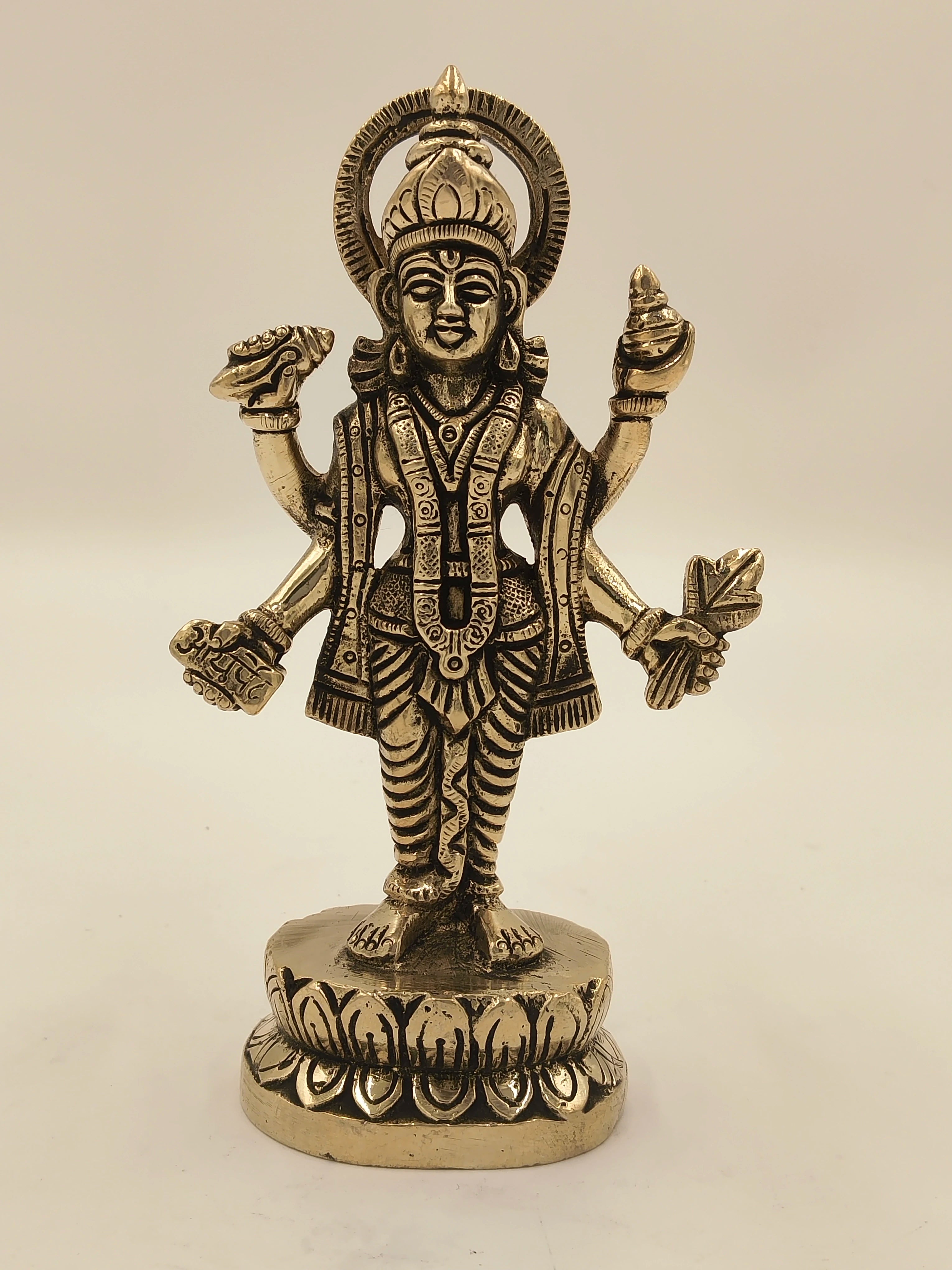 Medium-sized brass statue of Narayana standing on a lotus pedestal