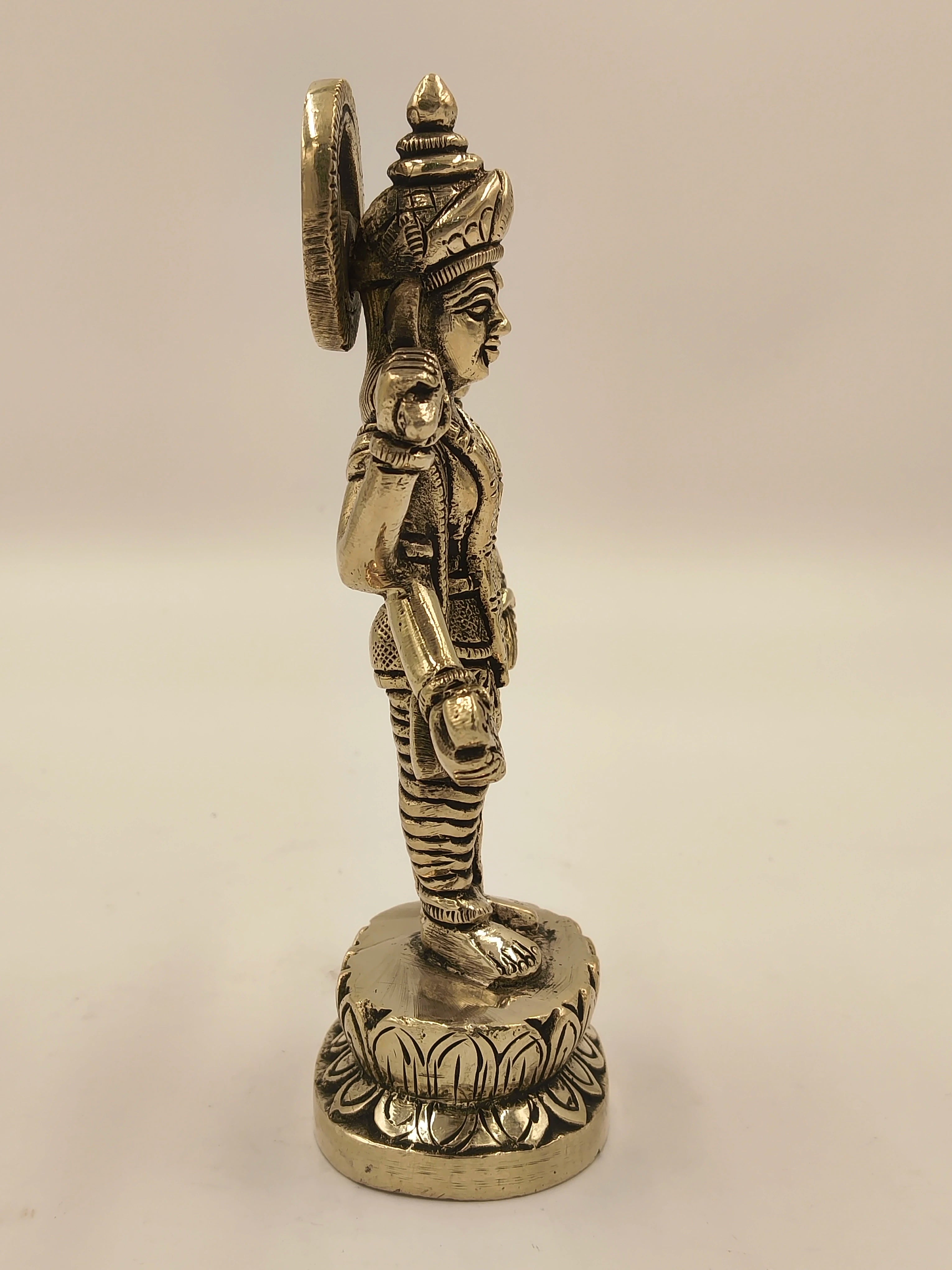 Side view of medium brass Narayana Vishnu statue with intricate detailing