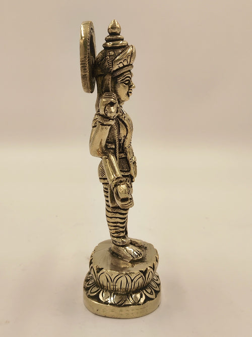 Side view of medium brass Narayana Vishnu statue with intricate detailing