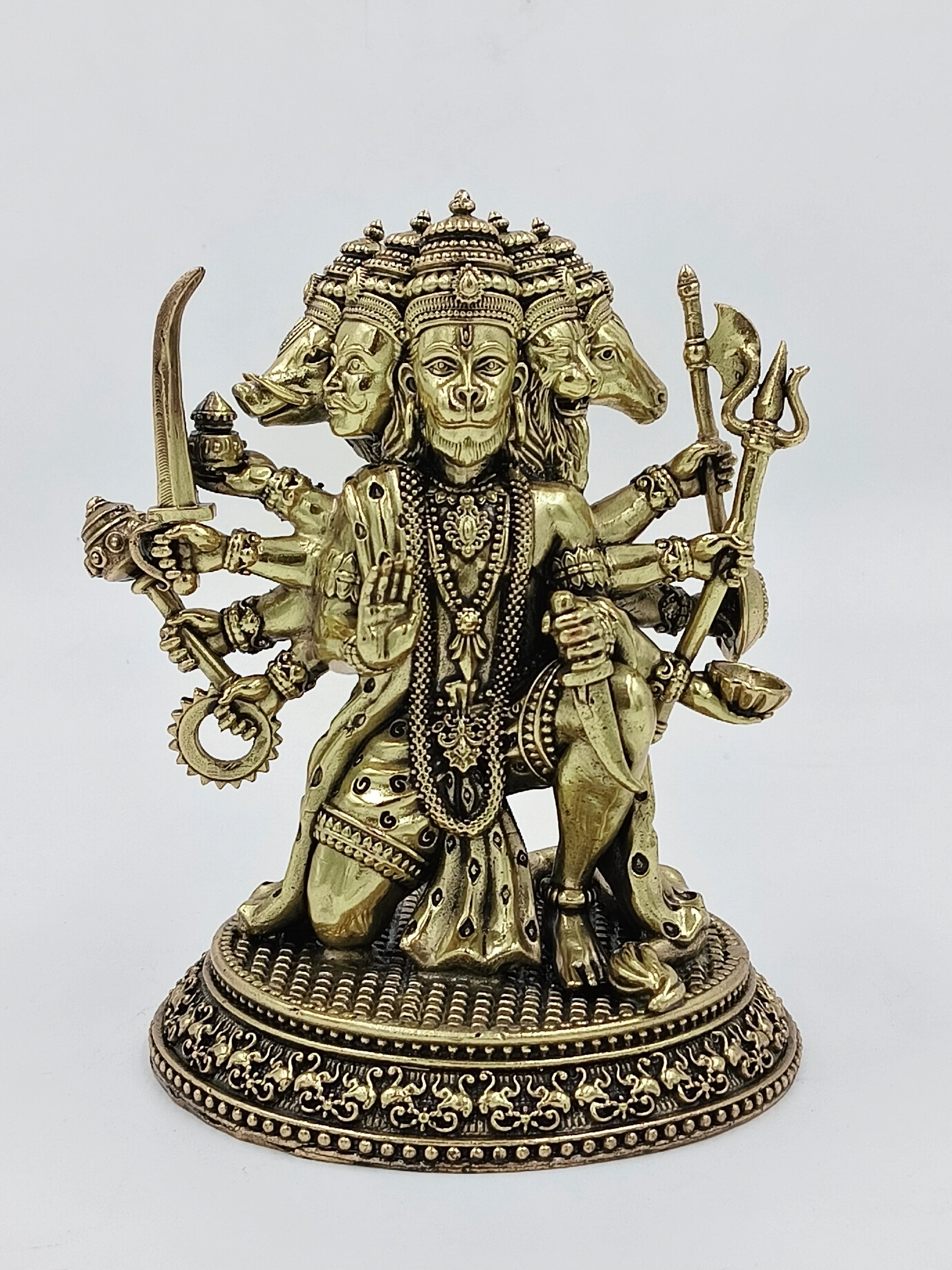 Brass statue of Pancavaktra Mahaveer with multiple heads and arms holding weapons