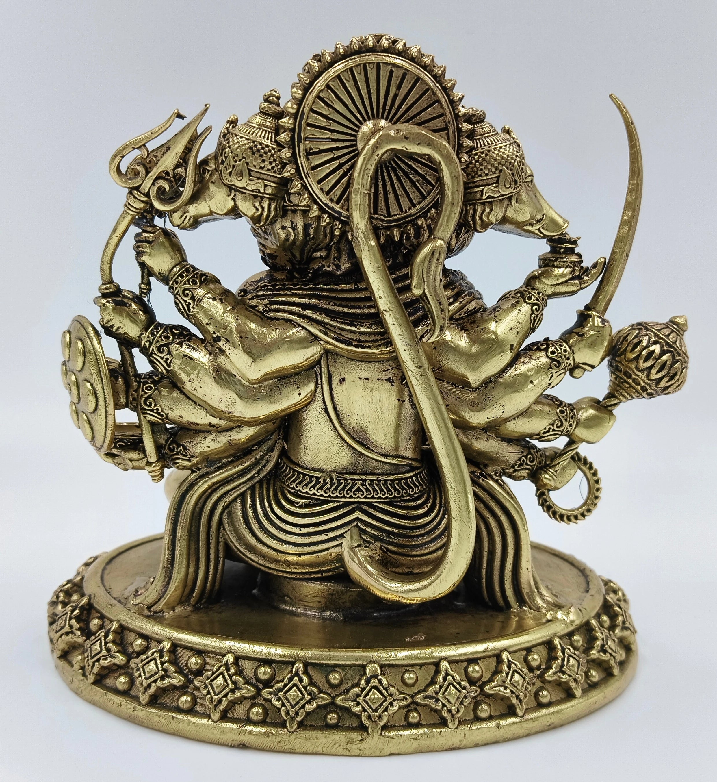 Back view of brass Panchamukhi Hanuman statue with five heads and multiple arms