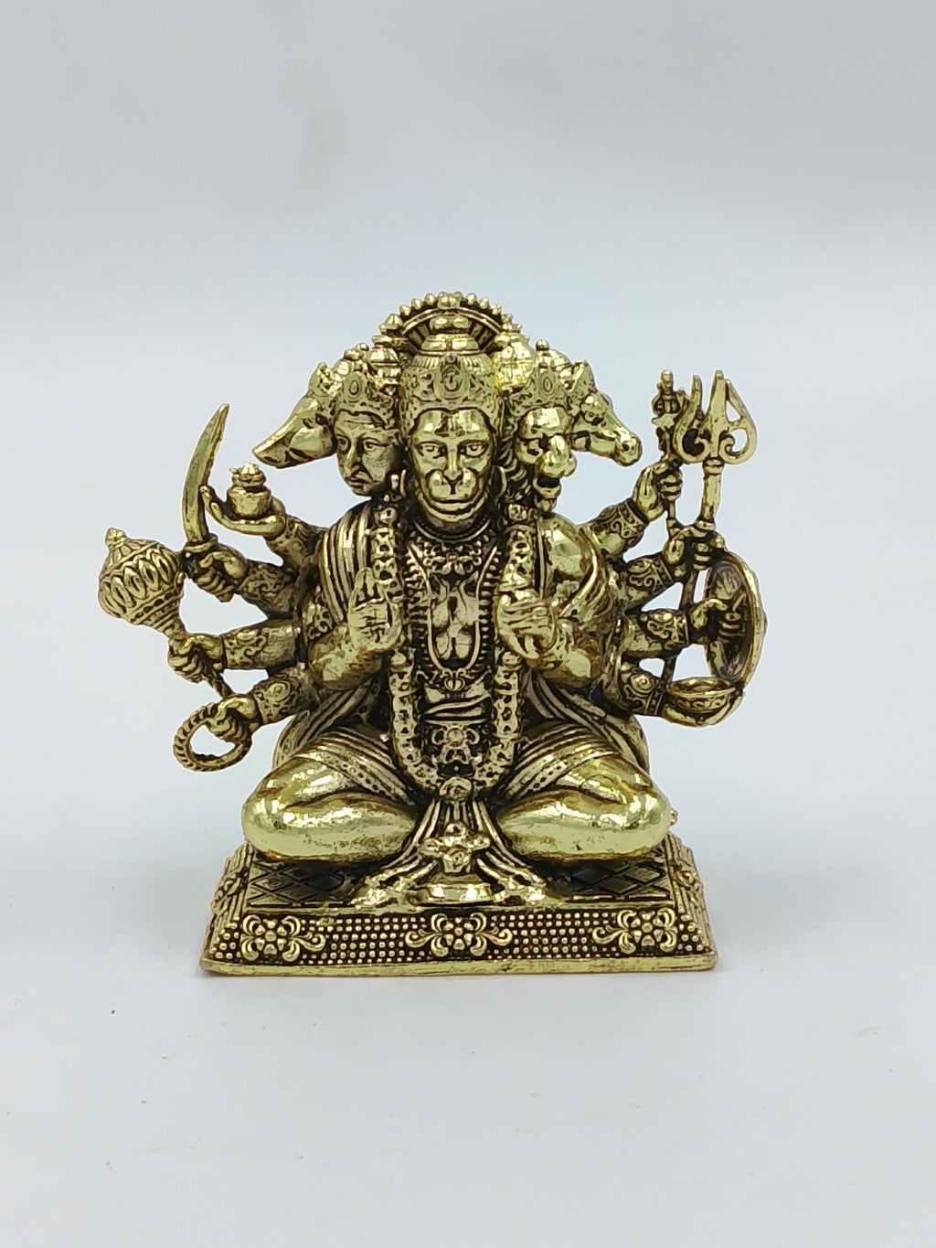 Small brass Panchamukhi Hanuman statue with five faces and multiple arms in seated pose